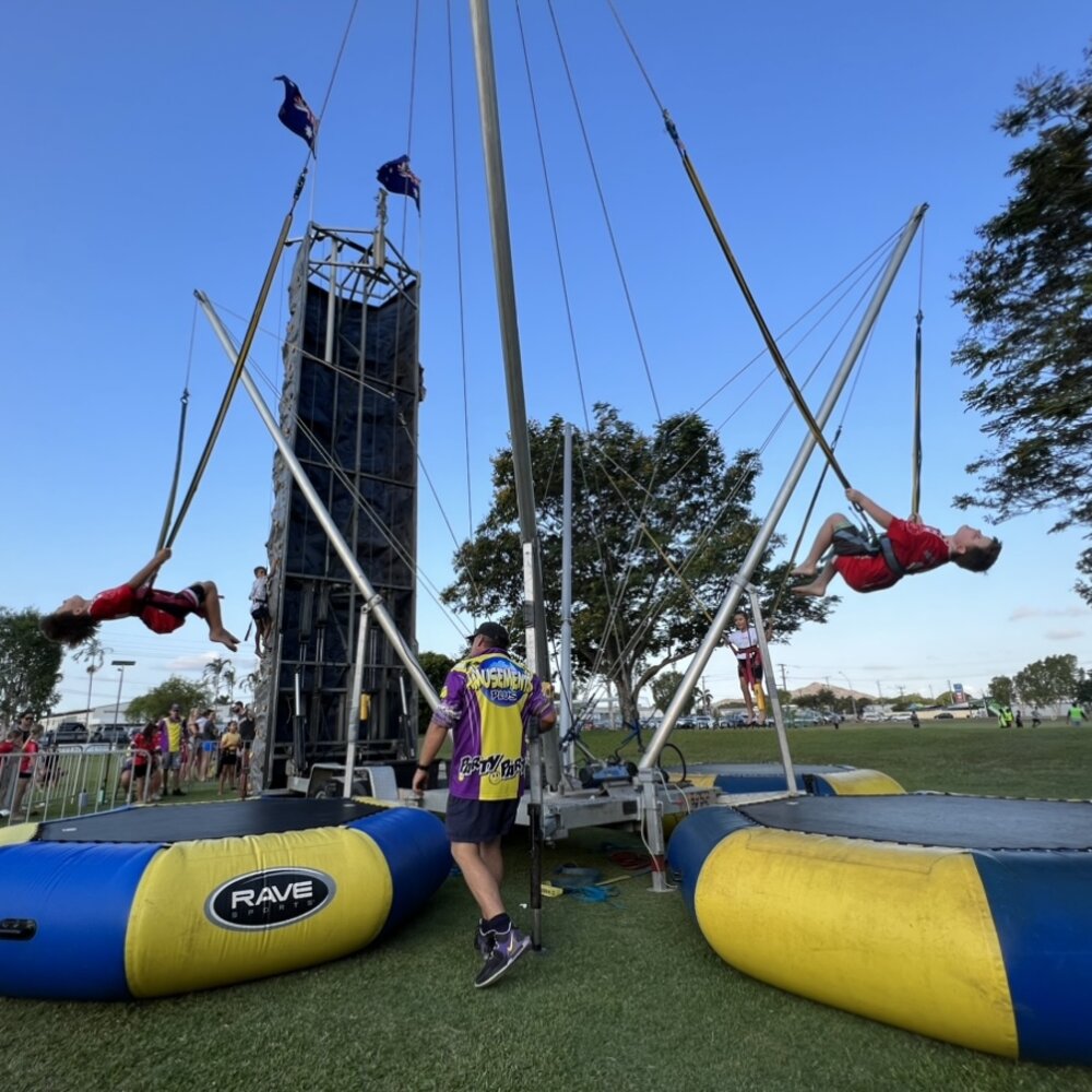 Rider on the bungee trampoline at an outdoor event